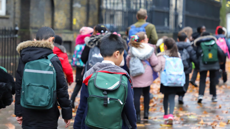 Photograph of school children approaching the gates of the British Museum in London (photograph © James Jiao / Adobe Stock)
