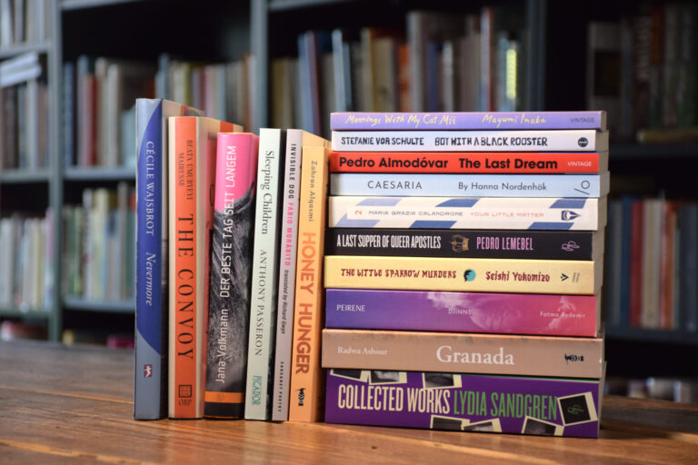 A stack of the winning and runner-up books