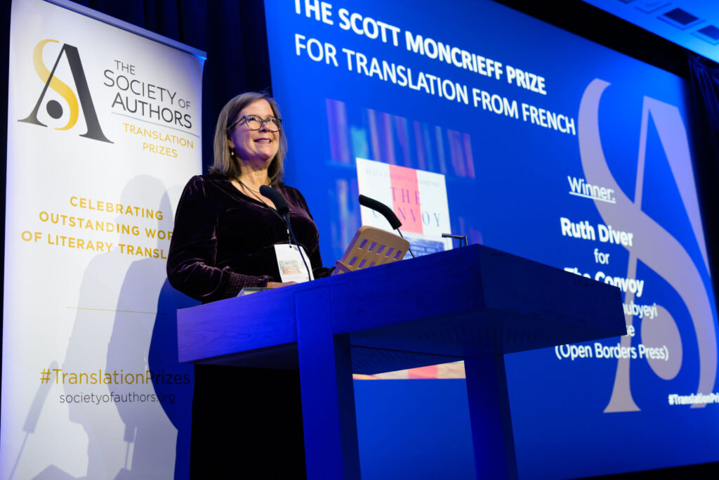 Ruth Diver at the lectern addressing the audience