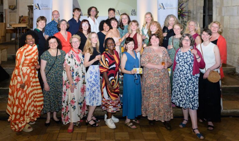 A large group of smiling people