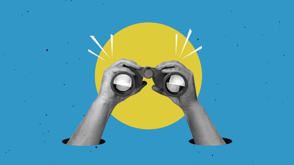 Hands holding binoculars on a blue background with a yellow circle