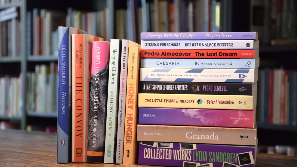 A stack of the winning and runner-up books